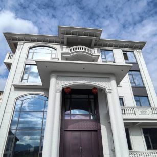 阜阳白麻别墅外墙干挂石材效果示例