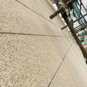 阜阳 黄金麻花岗岩荔枝面外墙干挂石材效果示例